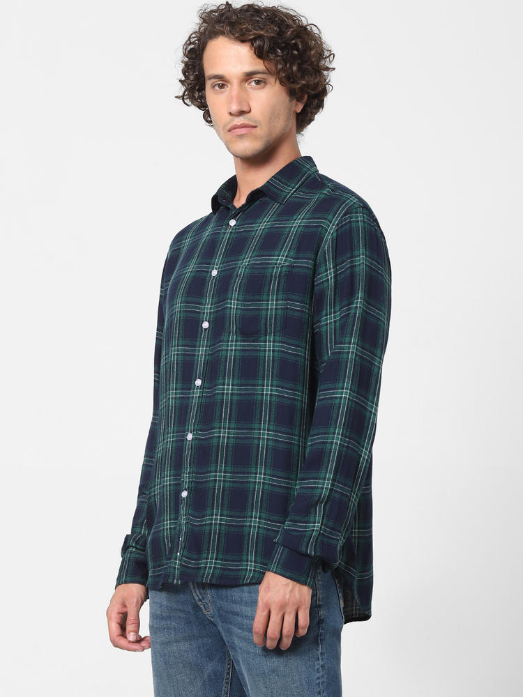green check shirt combination jeans