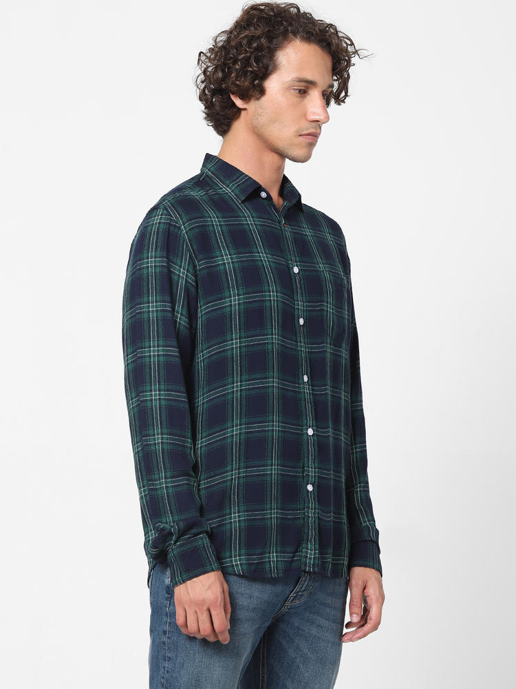 green check shirt combination jeans